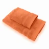 Set 1+1 asciugamano viso e ospite in spugna 650 gr arancione